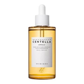 Bottle of Madagascan Centella Ampoule with a white label on a white background