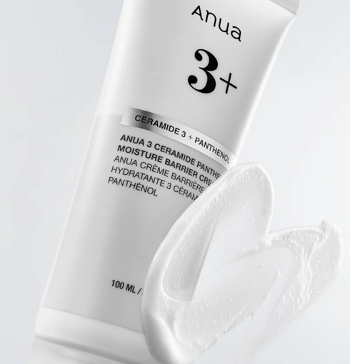 Anua 3+ skincare cream with visible  ingredients on a light gray background