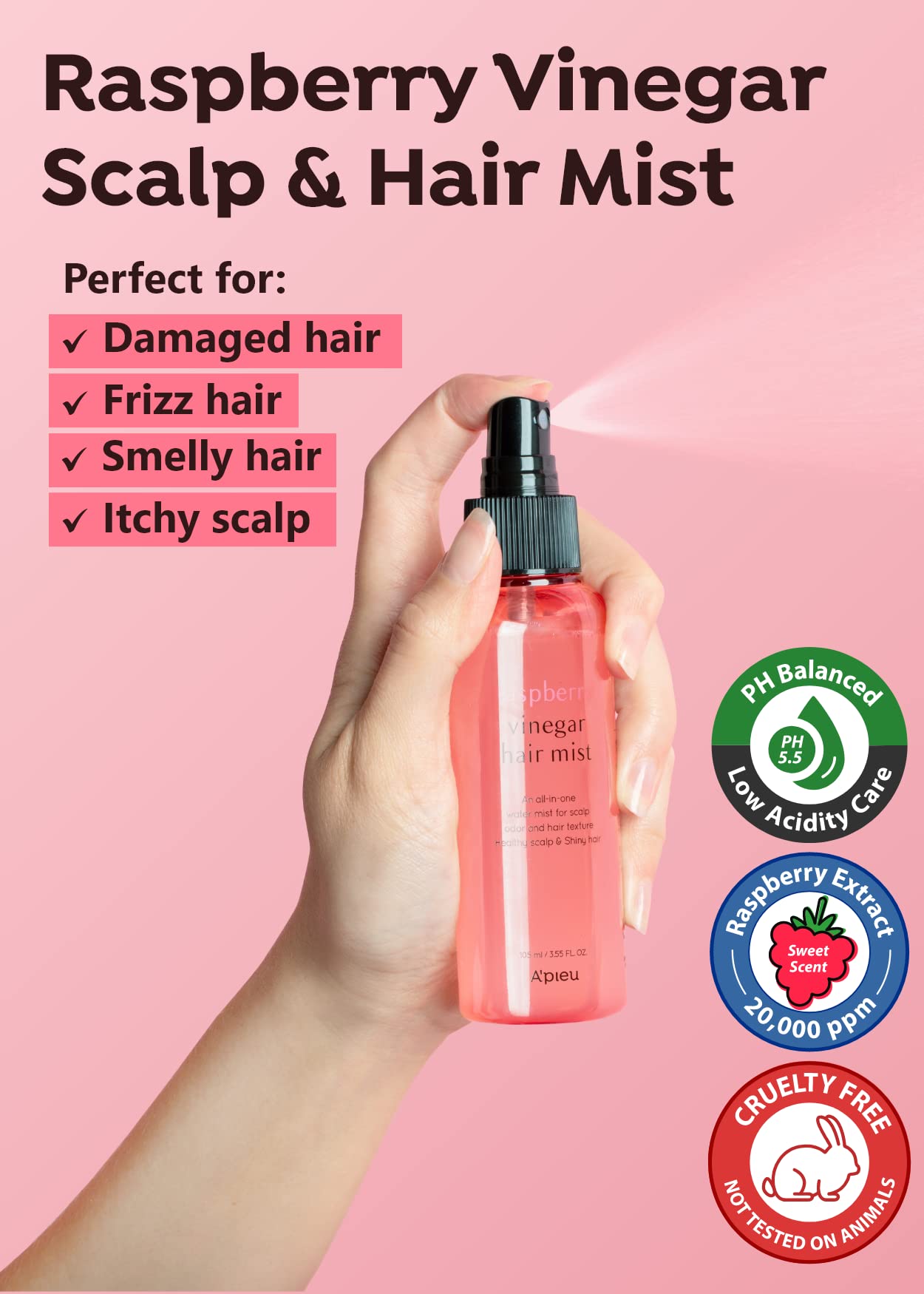 Raspberry Vinegar Scalp & Hair Mist bottle held by a hand with product benefits listed on a pink background.