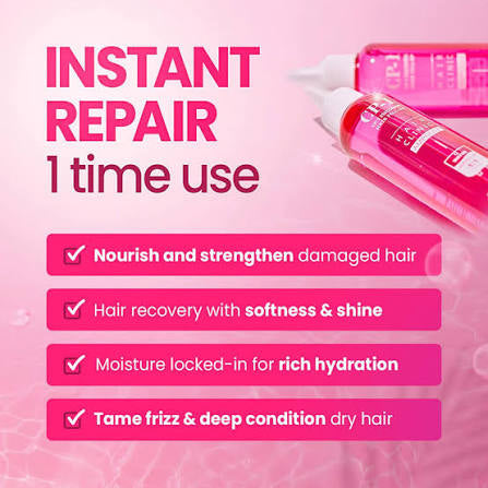 Hair care product with pink packaging on a pink background, featuring text about instant repair and benefits.