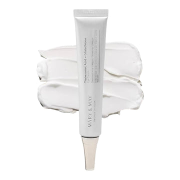 Skincare tube with white cream swatch on a white background.iceland