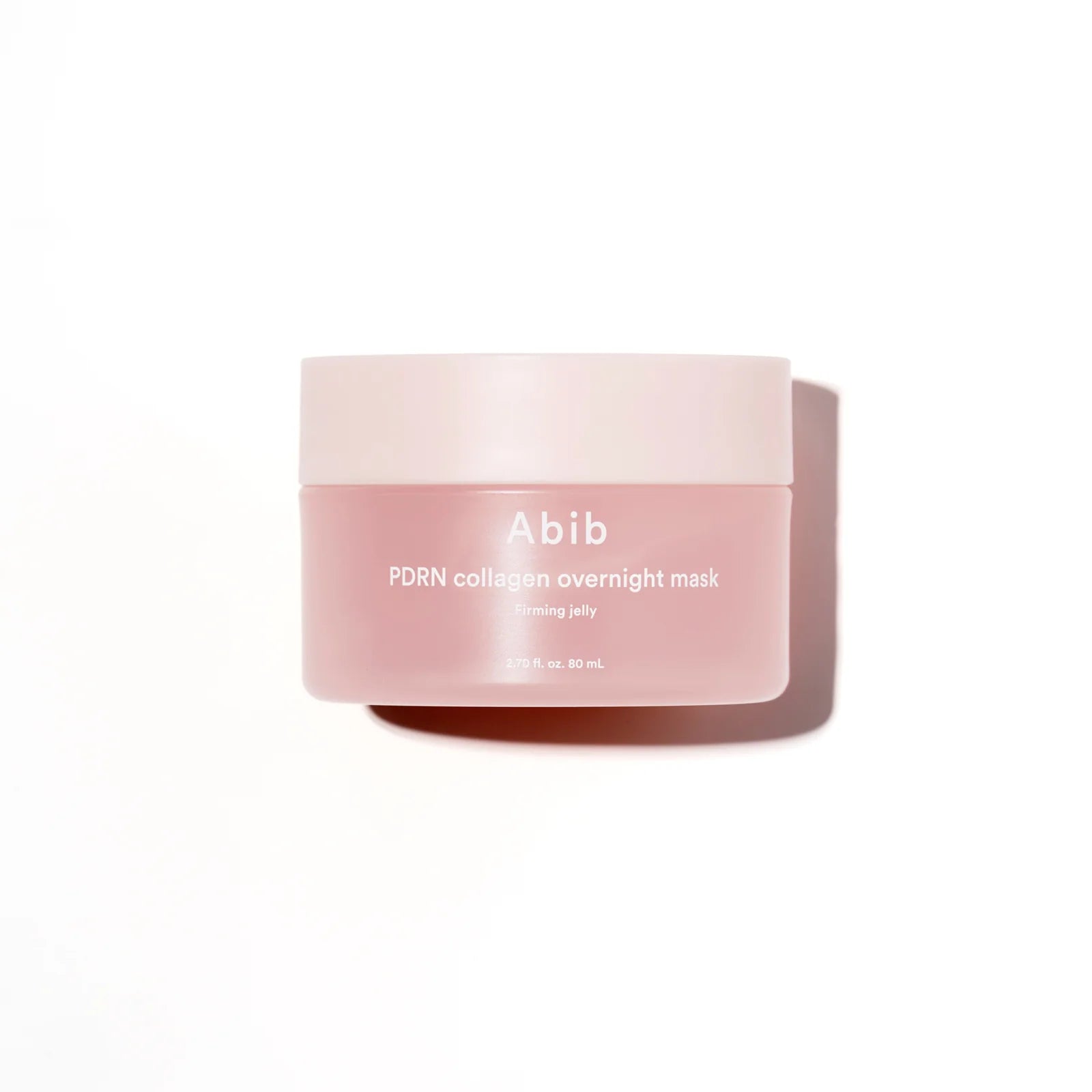 Pink jar of Abib PDRN collagen overnight mask on a white background