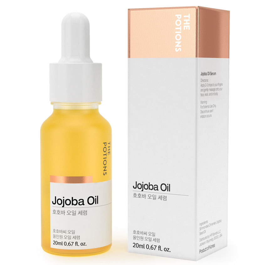 Jojoba oil dropper bottle with packaging on a white background
